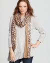 Splash sequins across any ensemble in Rachel Zoe's glitzy, extra-long scarf, lined with soft velvet.