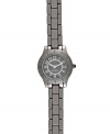 Take a page out of the menswear book with this modern watch from Nine West. Crafted of gunmetal tone mixed metal bracelet and round case with etched bezel. Gray dial with textured inner dial features silver tone numerals, hour and minute hands, sweeping second hand and logo at six o'clock. Quartz movement. Limited lifetime warranty.