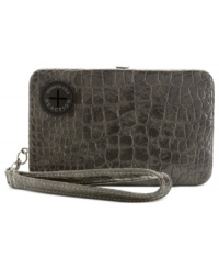 Fab meets function in this posh, croc-embossed wristlet case from Kenneth Cole Reaction that discretely stashes a music player or phone. Provides portal for ear buds so can grove on-the-go, and separate  compartments let you bring along cards, cash, coins and ID.