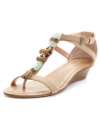 Go ahead, embellish a little! The unique T-strap Tandee sandals from BCBGeneration flaunt stone, antiqued metal and wood details for a one-of-a-kind look.