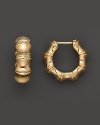 Bold bamboo hoops, rendered in richly gleaming 18K yellow gold.