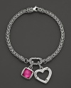 An intricately woven sterling silver chain holds a bamboo heart charm and a doublet gem of white quartz and pink rubelite corundum.