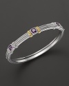 Detailed in 18K yellow gold, Judith Ripka's sterling silver and purple crystal bangle lends a timelessly luxe look.