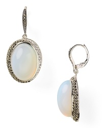 A classically glam look from Judith Jack. Glittering crystals frame large opal stones with luminescent milky depth - the perfect earrings for chiffon.