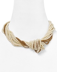 Don't settle for a single strand. ABS by Allen Schwartz's torsade necklace ups the glamour factor with chains and pearls. Clasp on the collar and captivate at cocktail hour.