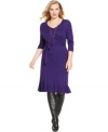 Fall in love with Spense's three-quarter-sleeve plus size sweater dress, finished by a belted waist and ruffled hem.