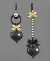 Mix it up with the fashionable black heart earrings by Betsey Johnson. Featuring goldtone and crystal accents, one earring measures approximately 3-1/2 inches while the other measures 2-1/2 inches.