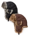 Surell's stylish, quilted aviator hat features faux fur ears and a flip-up brim.