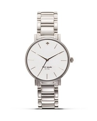 Take a citified approach to accessorizing with this bracelet watch from kate spade new york. Its round design is city chic, while the mother-of-pearl face is oh so sophisticated.