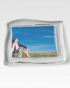 Surround a favorite photo with the easy elegance and classic beauty of this fine crystal frame. 5 X 7Imported