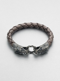 EXCLUSIVELY AT SAKS. A braided strand of luxuriously, smooth leather is offset by a sculpted sterling silver clasp.LeatherSterling silverAbout 3 diam.Imported