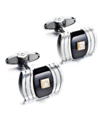 A little bit of everything. These sophisticated cuff links feature a rounded rectangular shape with a round-cut diamond center (1/2 ct. t.w.), onyx backdrop (10-3/4 ct. t.w.) and sterling silver setting with 14k gold accents. Approximate length: 3/4 inch. Approximate width: 7/16 inch.