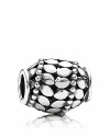 Gleaming silver and three dimensional texture define this elegant egg-shaped charm from PANDORA.