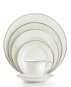 Refine your formal table with classic cream and white. Trimmed in platinum and accented with a raised dot and scroll pattern, the Opal Innocence Scroll 5-piece place settings bring contemporary grace to special occasions. A pearlized finish adds subtle shimmer.