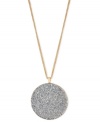 Kenneth Cole New York comes full circle. This necklace, crafted from gold-tone mixed metal, features a sparkling silver-colored glitter pendant. Item comes packaged in a signature Kenneth Cole New York Gift Box. Approximate length: 16 inches + 3-inch extender. Approximate drop: 2-1/10 inches.