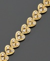 Express never ending love. This beautiful heart bracelet features diamond accents set in 18k gold over sterling silver. Approximate length: 7-1/4 inches.