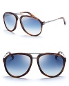 These vintage-inspired sunglasses from Gucci combine classic aviator frames with bold colors and mixed materials.