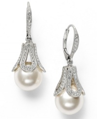 Add a little luxury to your look. Eliot Danori's drop earrings provide the perfect mix of shimmering simulated pearls (12 mm) and sparkling crystals in an elegant teardrop shape. Set in rhodium-plated mixed metal. Approximate drop: 3/4 inch.