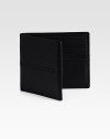 A timeless classic, handsomely designed in lightly textured leather and center stitch detail.One bill compartmentEight card slotsLeatherAbout 4W X 3½H Made in Italy