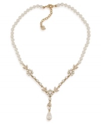 Stop and smell the flowers with this floral-designed necklace by Carolee. Glass and plastic pearls make a stunning statement with a plunging Y-shaped pendant embellished with glass stone accents. Crafted in gold tone mixed metal. Approximate length: 16 inches + 2-inch extender.