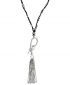 Slip into something new. Jessica Simpson's necklace is crafted from silver-tone mixed metal with a stylish tassel pendant. A snake motif adorns the black chord for a bit of an edge. Approximate length: 28 inches + 6-inch drop.