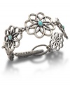 Keep the enchantment of wildflowers at hand with this sweet Lucky Brand bracelet. Flower links carved from distressed silver tone mixed metal feature semi-precious reconstituted calcite turquoise stones at center. Approximate length: 7-1/2 inches long.