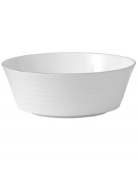 Wedgwood substitutes texture for tone in the exquisite Intaglio Platinum serving bowl. White bone china embossed with intricate geometric patterns is undeniably modern but inspired by Georgian-era designs.