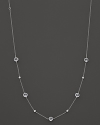 Stations of diamonds and clear quartz dot a sterling silver chain. By Ippolita.