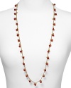 Sure to stun, this coral beaded necklace from Lauren Ralph Lauren brings beach-inspired beauty to your neckline.