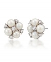 Pearl perfection. Luminous imitation pearls yield timeless elegance for Carolee's small cluster button earrings. Crafted in silver tone mixed metal, they're adorned with sparkling glass accents. Approximate diameter: 1/2 inch.