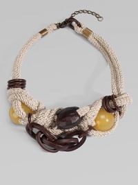 A bold, Italian made necklace featuring brass chains and bead details.RopeBrass and beadsBack clasp closureLength, about 21Made in Italy