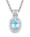 A graceful pendant that's dazzling to behold. An oval-cut aquamarine (2-1/5 ct. t.w.) is surrounded by sparkling round-cut diamonds (1/3 ct. t.w.). Set in 14k white gold. Rope chain measures 18 inches.