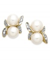 A natural choice. These earrings, crafted from 10k gold, exudes elegance with cultured freshwater pearls (5 mm) and diamond accents along a whimsical leaf motif. Approximate drop: 5/8 inch. Approximate width: 1/3 inch