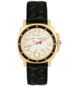 A little old-fashioned and a little over-the-top. Watch by Betsey Johnson crafted of black quilted leather strap and round polished gold tone mixed metal case with black bezel. White dial features whimsical gold tone numerals, gold tone hour and minute hands, pink second hand with heart and logo. Quartz movement. Water resistant to 30 meters. Two-year limited warranty.