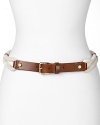 Tory Burch lends a classic, nautical-inspired touch to your waistline with this belt, crafted of rope and trimmed in leather.