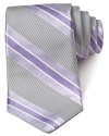 In a traditional palette, this handsomely striped tie from Ike Behar lends a sophisticated look.