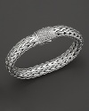 Large signature woven chain bracelet with diamond pavé clasp, designed by John Hardy.