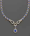 A stunning and sophisticated style, sure to turn heads. Pear-shaped sapphires (12 ct. t.w.) and round-cut diamonds (1/5 ct. t.w.) set in 14k gold. Length measures 16 inches; drop measures 1 inch.