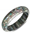 Like a beautiful piece of artwork, this stunning slip-on bangle combines tiny pieces of Mother of Pearl in a unique mosaic pattern. Approximate length: 7-1/2 inches.