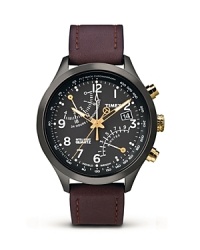 This Timex timepiece boasts more than just good looks, features including Fly-back chronograph movement with 4 hour auto shut-off, Indiglo® night-light, second time zone functionality. A leather strap lends a classic finish.