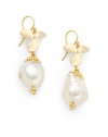 THE LOOKWhite baroque pearl detailsFlower accents with leaf setting18k yellow goldplated brassEar wireTHE MEASUREMENTLength, about 1.5ORIGINMade in USA