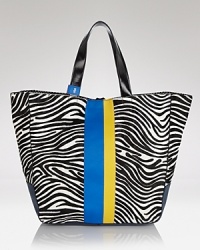 Work a two tone vibe with this tote from Juicy Couture. An updated take of the brand's much loved day bag, this glam style flaunts bold black and white stripes and cool color blocked detailing.