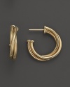 Classic half hoop earrings in 18K yellow gold. From Roberto Coin.