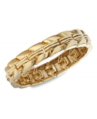 Chevrons star in this stretch bracelet from Fossil. Crafted from gold-tone mixed metal. Approximate diameter: 2-1/4 inches.