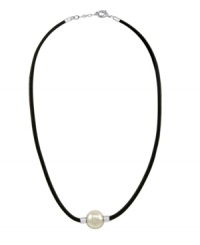 A modern spin on the traditional pearl pendant. Majorica necklace features a white, organic, man-made pearl (14 mm) strung on a trendy black leather cord. Setting and clasp crafted in sterling silver. Approximate length: 18 inches + 2-inch extender. Approximate drop: 1/2 inch.