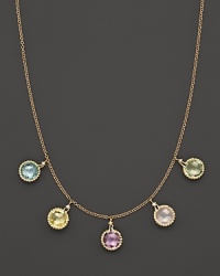 Semiprecious faceted gems add brilliant color to 18K yellow gold. By Roberto Coin.