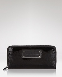 Practical accessories have a place in every it-girl's purse. But in a cool hue, this patent leather wallet from MARC BY MARC JACOBS is almost too chic to keep inside.