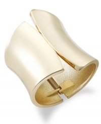 INC International Concepts makes a bold statement with this cuff bracelet. Crafted from gold-tone mixed metal, the bracelet's shape offers a bit of post-modern panache. Approximate diameter: 2-1/2 inches.