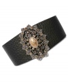 An ornate centerpiece sets this cuff bracelet from Lucky Brand apart. Crafted from gold- and silver-tone mixed metal with glass stones adding luster, the center lies on a leather bracelet for a bit of an edge. Approximate diameter: 2-1/2 inches.