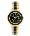 Decadent design for everyday elegance. Watch by Style&co. crafted of black and gold tone mixed metal bracelet and round gold tone case with black bezel. Glossy black dial features applied gold tone numerals, minute track, three hands and logo. Quartz movement. Splash resistant. Two-year limited warranty.